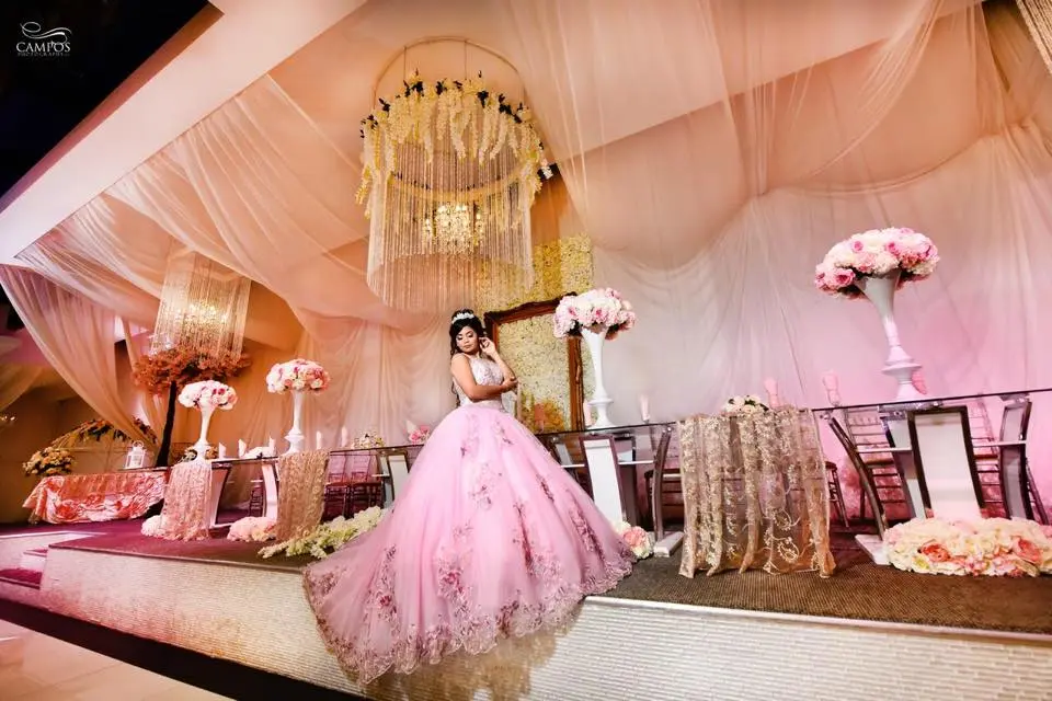 Quinceañera in a pink gown at Legends Event Center